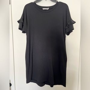 Black Ruffle Sleeve detail dress with pockets. SZ Small.